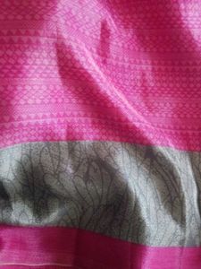 Vibrant Pink Saree with Intricate Pattern