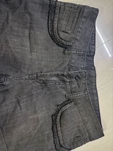 Stylish Denim Shorts with Embellished Pockets