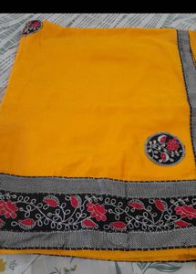 Elegant Yellow Saree with Floral Embroidery