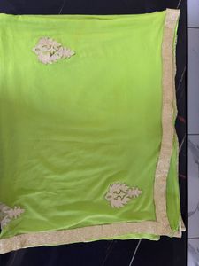 Vibrant Green Saree with Golden Border