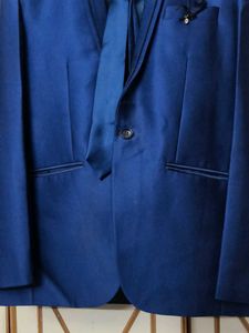 Men's Blue Suit with Tie and Pocket Square
