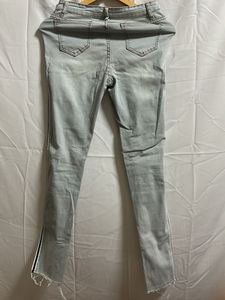 Light Wash Ripped Jeans with Side Stripe