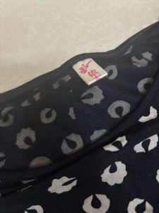 Black &amp; White Patterned Peplum Top with Solid