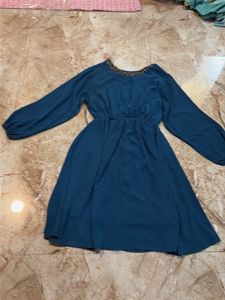 Elegant Teal Dress with Embellished Neckline