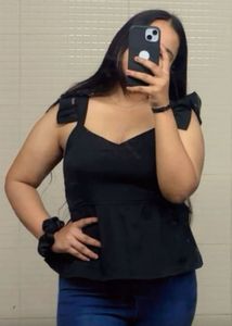 Black top sleeveless elegant looking