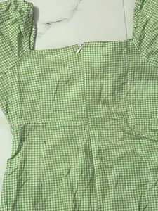Green tie on summer dress