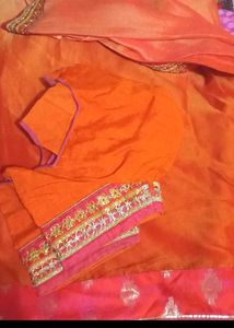 Vibrant Orange Saree with Pink Border