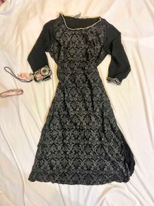 Elegant Black Kurta Set with Intricate Design
