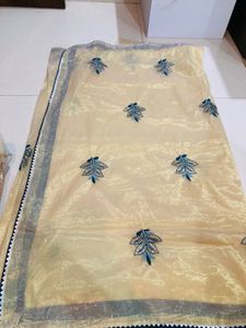 Elegant Embroidered Cream Saree