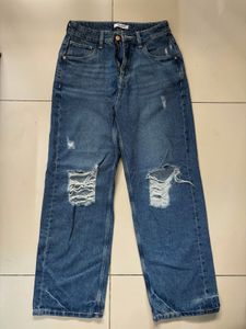 Distressed Blue Denim Jeans