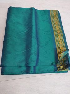 Elegant Teal Saree with Gold Border