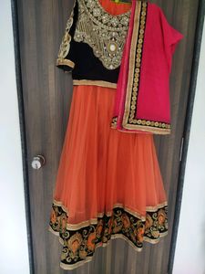 Velvet blouse with net dupatta and lahenga.    nav