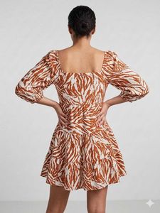 Chic Zebra Print Ruffle Mini Dress