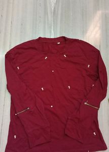 It's New Unused Maroon Coloured T Shirt.