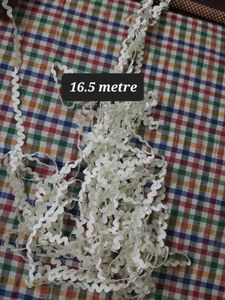 Embroidery Floss Thread Skeins and white lace.