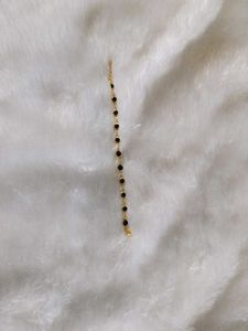 Gold-Tone Bracelet with Black Beads