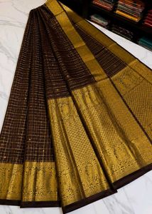 Elegant Brown Saree with Gold Border