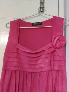 Chic Pink Sleeveless Top with Floral Accent