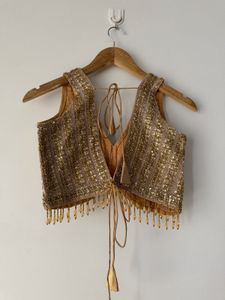 Embellished V-Neck Sleeveless Blouse