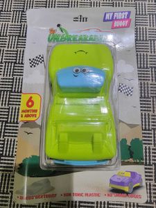 Two toys - Buggy and Racing car to