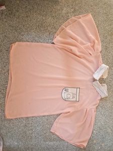 Peach cute crop top with a white collor