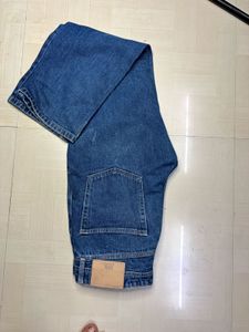 Stylish Blue Jeans with Paint Splatter Detail