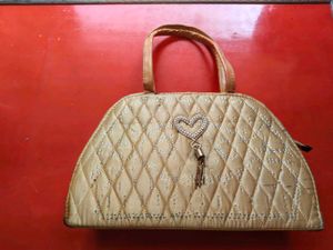 Quilted Beaded Handbag with Heart Charm