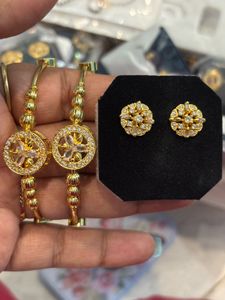 Elegant Gold Bangles with Matching Earrings