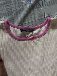 Ribbed Cream Top with Pink Trim