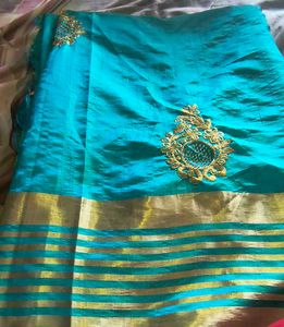 Stunning Teal Saree with Gold Border