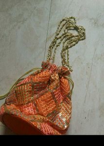 Elegant Red Potli pouch with Pearls