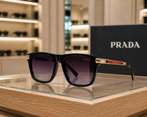 Prada Sunglasses - Black Frame