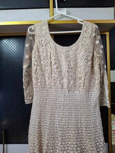 Elegant Beige Embroidered Anarkali gown