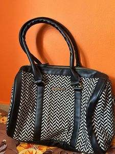 ASTRID Women's Black Textured Canvas Duffle Bag