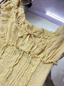 Sheer Ruffle Tie Front Top