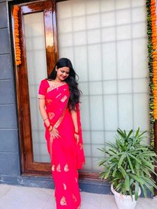 Vibrant Red Saree with Golden Motifs