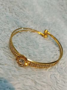 Elegant Gold Tone Bangle Bracelet with CZ Stones