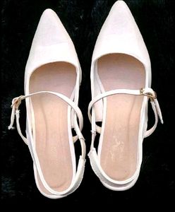 White Pointed Slingback Heels.