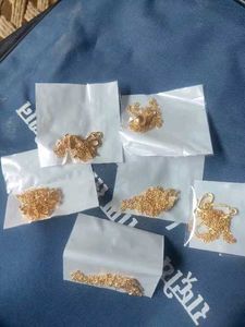 Set of dainty gold necklaces with charms