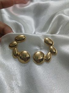Gold Tone Abstract Earrings