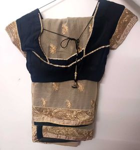 Elegant Embroidered Golden Black Heavy Saree