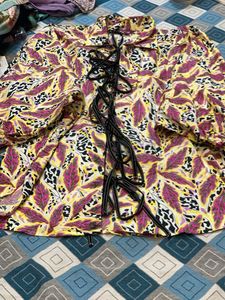 Vibrant Floral Print Lace-Up Blouse