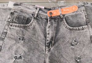 Distressed Gray Denim Jeans