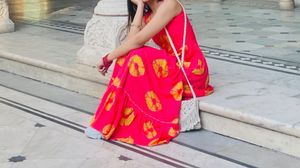 Vibrant Red Ethnic Gown with Yellow Motif