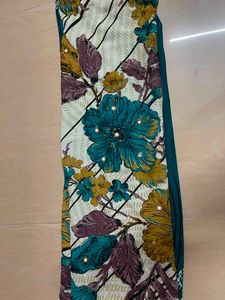Vibrant Teal Saree with Abstract Print