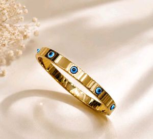 Gold Tone Evil Eye Bangle Bracelet