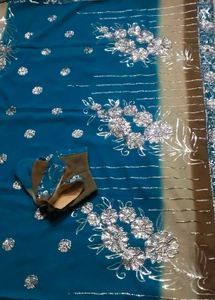 Stunning Teal Blue Saree with Silver Embellishment