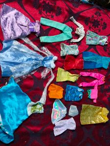 new and old Barbie dolls cloth lot