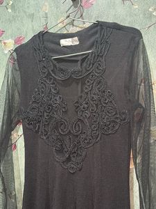 Elegant Black Dress with Lace Detail