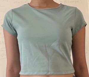 flattering sage green crop top